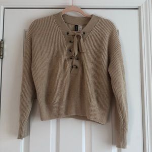Divided oatmeal lace up sweater